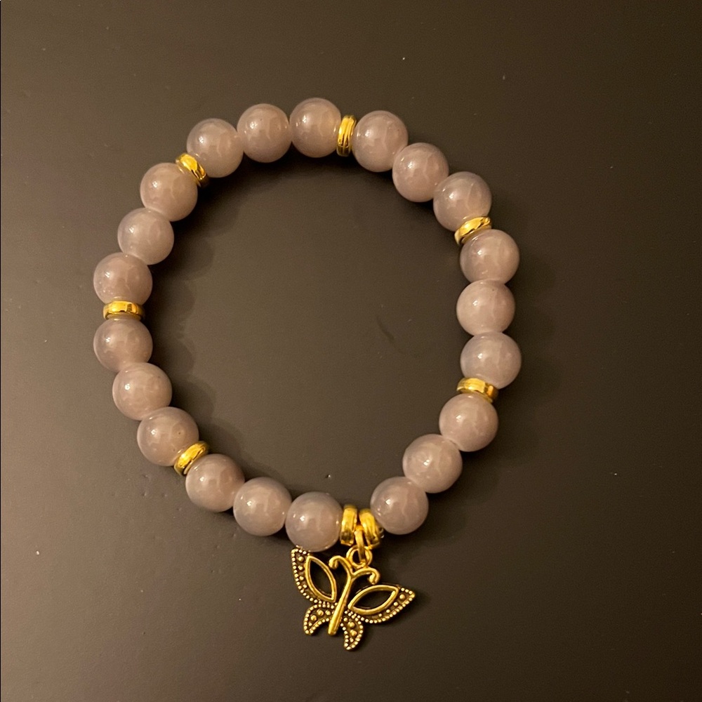 Hand Crafted Grey and Gold Beaded Bracelet with Butterfly Charm